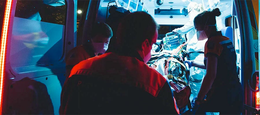Interior of an ambulance with medical personal 